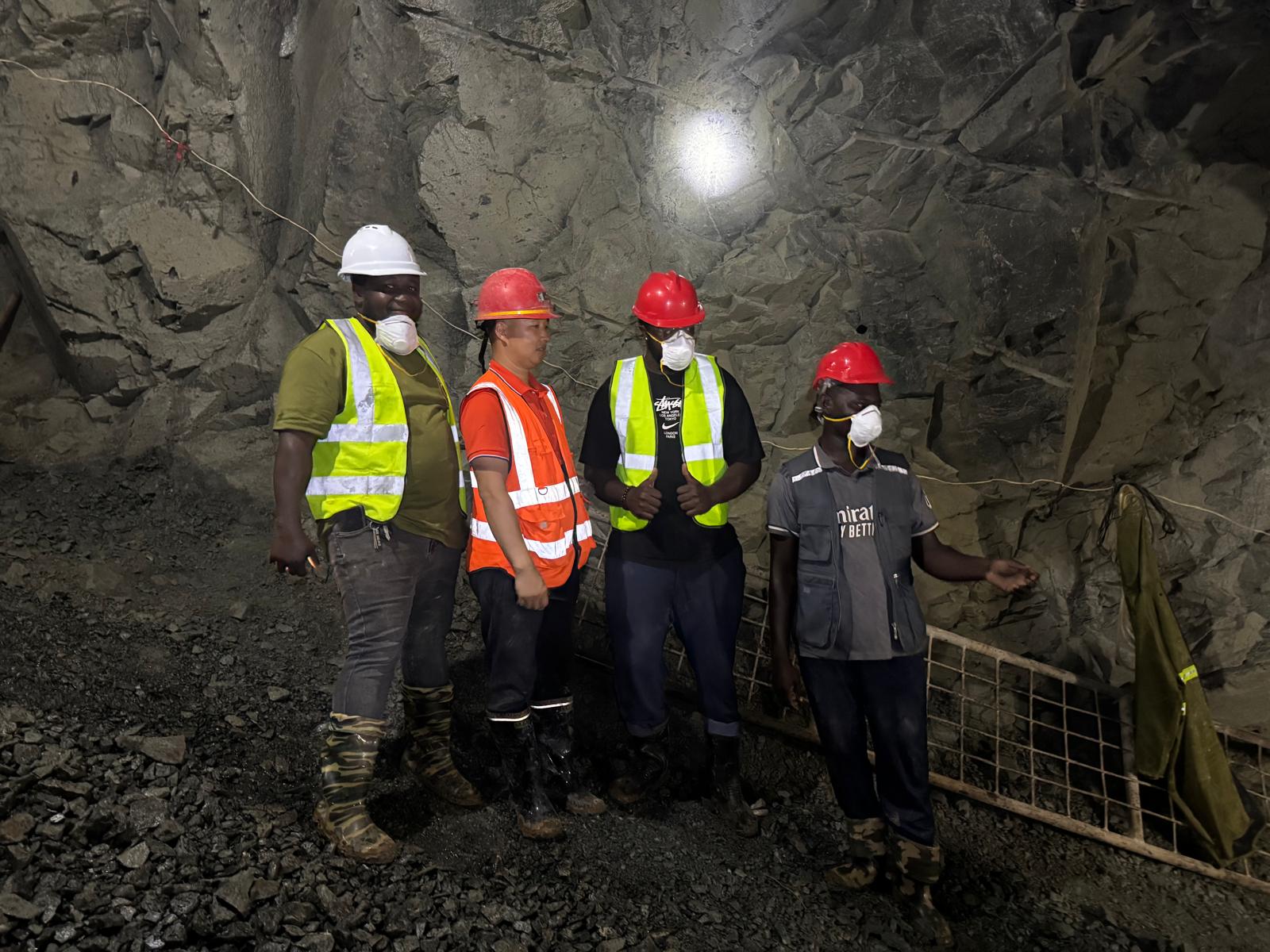 Underground crew and technical partners at the working face